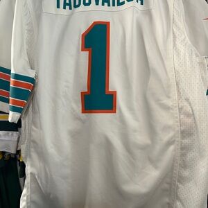 NFL White Jersey with Teal and Orange Number
